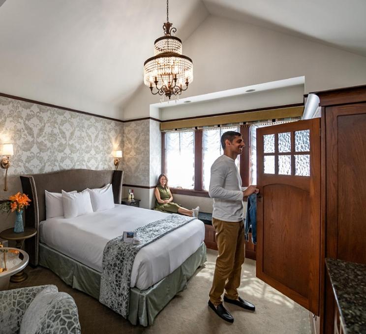 A couple explores their room at Abigail's Hotel in Victoria, BC